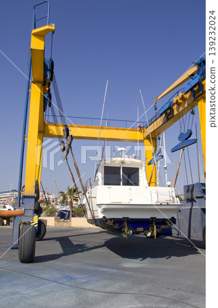 boat crane travelift lifting motorboat boat crane travelift lifting motorboat 139232024