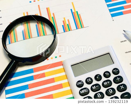 Graphs, magnifying glasses, and calculators 139232119