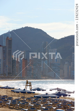 Benidorm sunrise with hammocks and parasol Benidorm sunrise with hammocks and parasol 139232424