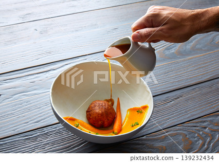 Dumpling of old cowtail with creamy carrot Dumpling of old cowtail with creamy carrot 139232434