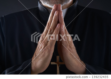 Praying hands priest portrait of male Praying hands priest portrait of male 139232435