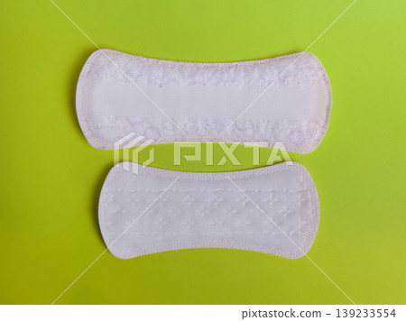 Menstrual pads on orange background. 139233554