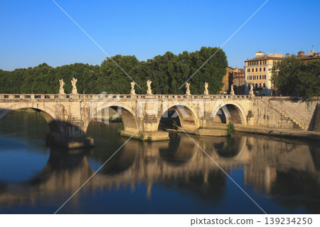 Ponte Sant'Angelo and reflections on the Tiber River in Rome Ponte Sant'Angelo and reflections on the Tiber River in Rome 139234250