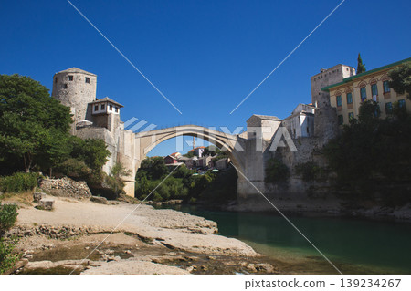 The historic Stari Most (Old Bridge) spanning the Neretva River in Mostar, Bosnia and Herzegovina The historic Stari Most (Old Bridge) spanning the Neretva River in Mostar, Bosnia and Herzegovina 139234267