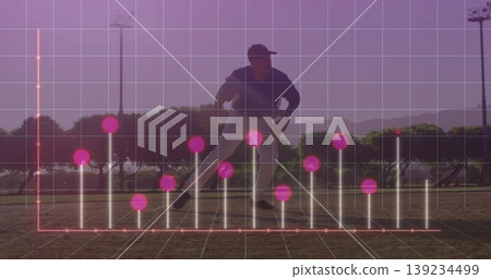 Sliding infielder wearing white-and-navy uniform on dirt infield, glove and pink bar graph overlay Sliding infielder wearing white-and-navy uniform on dirt infield, glove and pink bar graph overlay 139234499