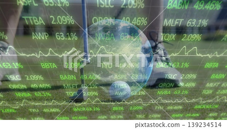 Resting glass globe depicting Earth on courtyard lawn, with metal post and green ticker overlays Resting glass globe depicting Earth on courtyard lawn, with metal post and green ticker overlays 139234514