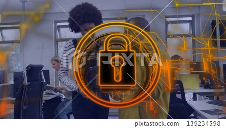Four cybersecurity professionals analyzing holographic padlock overlay in open-plan office Four cybersecurity professionals analyzing holographic padlock overlay in open-plan office 139234598