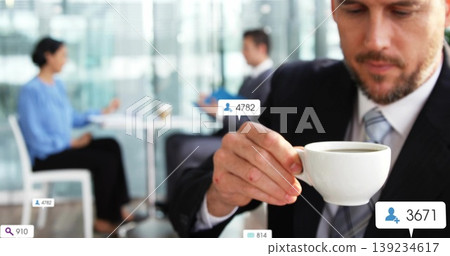 Sipping coffee from white ceramic cup, man in suit in lounge, with floating engagement icons Sipping coffee from white ceramic cup, man in suit in lounge, with floating engagement icons 139234617