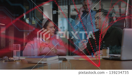 Collaborating business team discussing plans in boardroom, with table notebooks laptop smartphone 139234735