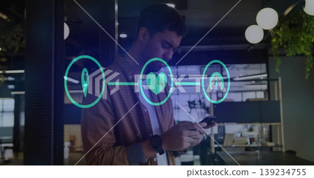 Interacting man wearing brown shirt holding smartphone manipulating holographic icons in office Interacting man wearing brown shirt holding smartphone manipulating holographic icons in office 139234755