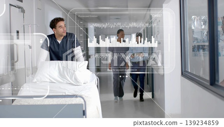 Staff in scrubs pushing bed with IV-pole through hospital hallway with floating overlay, copy space Staff in scrubs pushing bed with IV-pole through hospital hallway with floating overlay, copy space 139234859