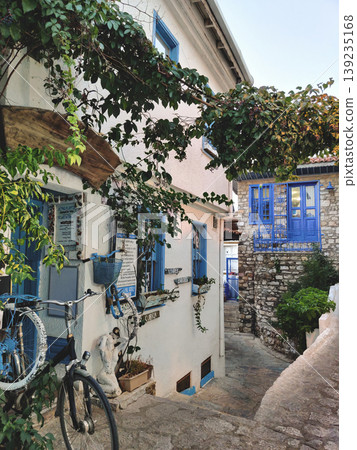 Cozy narrow street with a bicycle and traditional stone houses in Marmaris Turkey Cozy narrow street with a bicycle and traditional stone houses in Marmaris Turkey 139235168