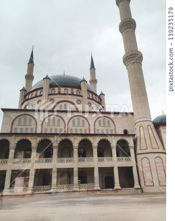 Majestic architecture of Nevsehir Kulliye Mosque with tall minarets in Turkey Majestic architecture of Nevsehir Kulliye Mosque with tall minarets in Turkey 139235179