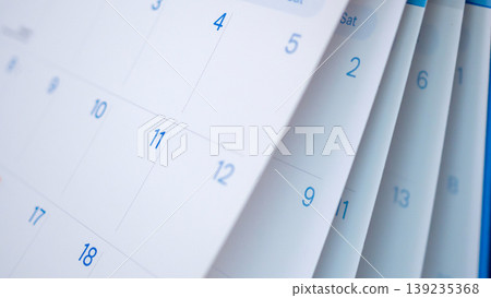 Abstract blur calendar page flipping sheet close up background business schedule planning appointment meeting concept Abstract blur calendar page flipping sheet close up background business schedule planning appointment meeting concept 139235368