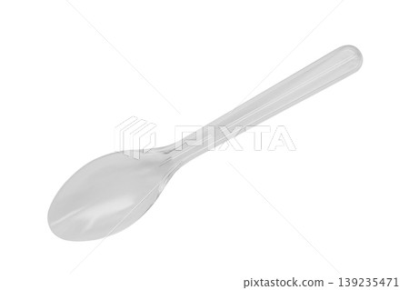 Transparent plastic spoon isolated on white background Transparent plastic spoon isolated on white background 139235471