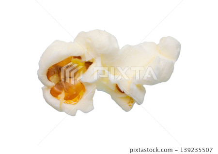 Tasty popcorn close up isolated on white background Tasty popcorn close up isolated on white background 139235507