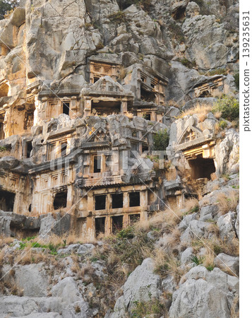 Ancient Lycian rock-cut tombs carved into the cliffs in Myra Turkey 139235631