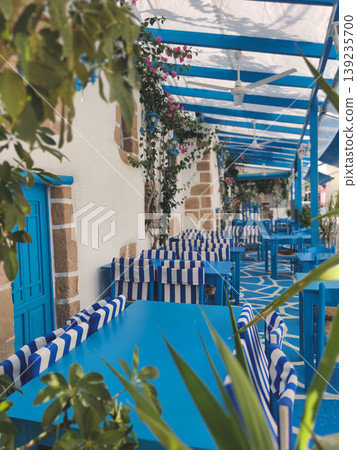 Traditional blue and white Greek tavern terrace in Rhodes 139235700