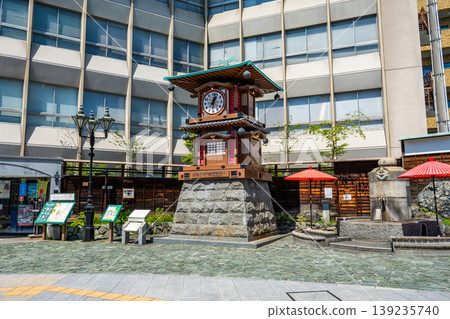 The Botchan Karakuri Clock and footbath in front of Dogo Onsen Station 139235740