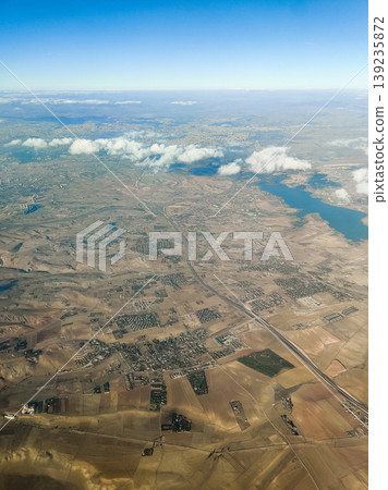 sky from the height of the flight of the plane with a view of the continent and countries sky from the height of the flight of the plane with a view of the continent and countries 139235872