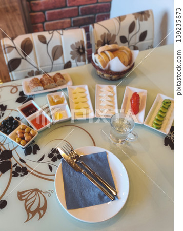 Traditional Turkish breakfast spread on a decorated table 139235873