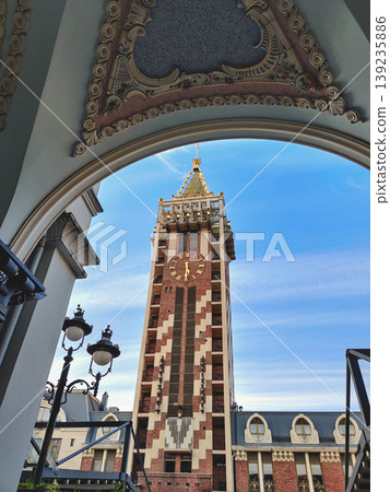 View of the Astronomical Clock tower through an ornate arch on Piazza Square in Batumi View of the Astronomical Clock tower through an ornate arch on Piazza Square in Batumi 139235886