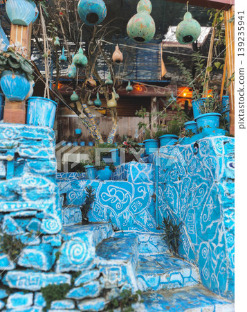 Traditional Greek style blue painted stone stairs with hanging gourd lamps Traditional Greek style blue painted stone stairs with hanging gourd lamps 139235941