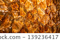 abstract golden glass wall texture shiny yellow amber pattern glowing geometric surface beautiful architectural background design element modern luxury light space decoration art 139236417
