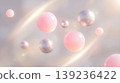 floating pink and silver glossy spheres with warm glowing light streaks against abstract blurred background representing elegant cosmetics luxury pearl beauty design 139236422