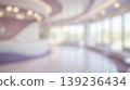 Blurred abstract background modern futuristic bright medical clinic reception office interior empty waiting room area elegant curved purple architectural design details 139236434