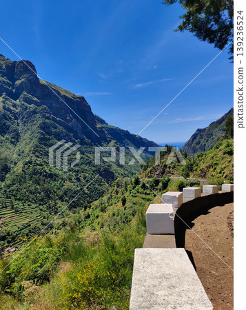 observation deck with a view of rocky mountains on the island of Madeira in Portugal observation deck with a view of rocky mountains on the island of Madeira in Portugal 139236524
