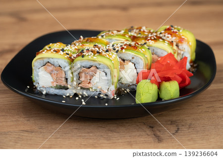delicious traditional Japanese sushi and rolls on a plate 139236604