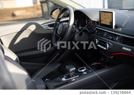 Interior view of the center console and dashboard of a luxury sedan Interior view of the center console and dashboard of a luxury sedan 139236664