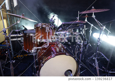 Professional drum kit set up on a stage for a live concert Professional drum kit set up on a stage for a live concert 139236817