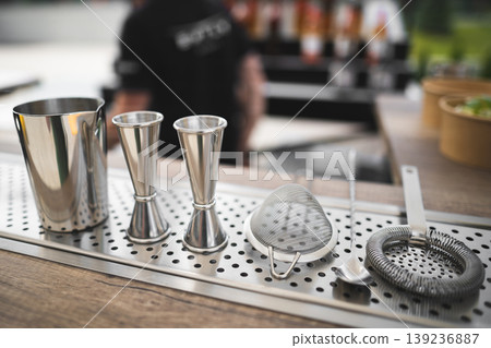 professional accessories on the table for making an alcoholic cocktail by a bartender professional accessories on the table for making an alcoholic cocktail by a bartender 139236887