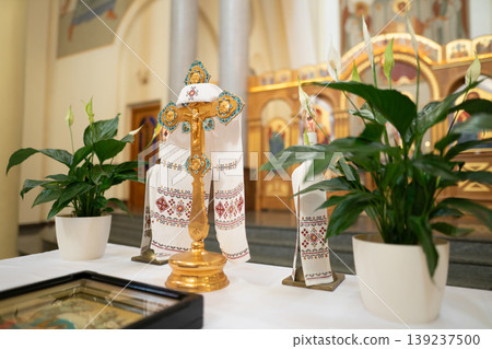 Golden altar cross with embroidered rushnyk and peace lilies Golden altar cross with embroidered rushnyk and peace lilies 139237500