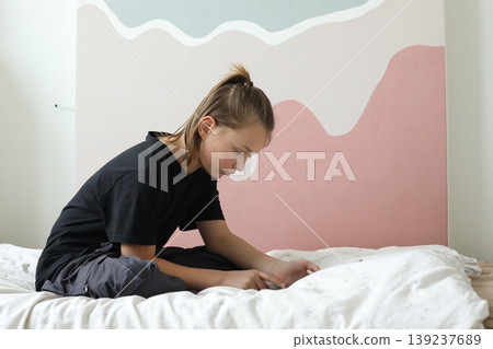 Child boy using pc tablet and playing. Kid at home 139237689