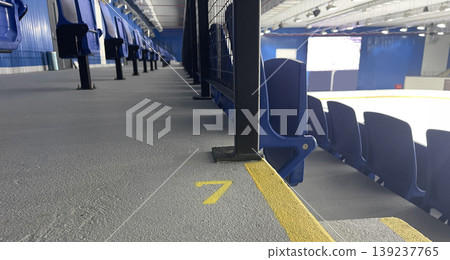 benches, stairs and an empty stadium for a sporting event benches, stairs and an empty stadium for a sporting event 139237765