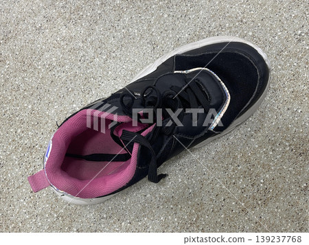 sneaker on the gray background. top view sneaker on the gray background. top view 139237768