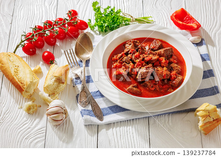 Hungarian beef goulash in a white bowl Hungarian beef goulash in a white bowl 139237784