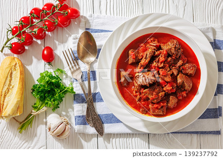 Hungarian beef goulash in a white bowl Hungarian beef goulash in a white bowl 139237792