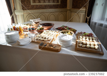 delicious snacks and drinks on the buffet table 139237882