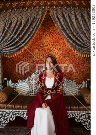 Young girl in luxury traditional Turkish sultan costume in Turkey Young girl in luxury traditional Turkish sultan costume in Turkey 139238002
