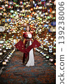 Young girl in Ottoman dress posing in traditional Turkish lamp shop in Turkey 139238006