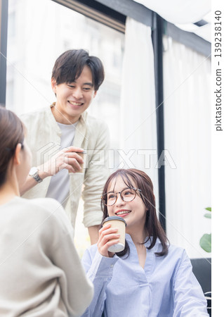 Business people having a meeting while drinking coffee 139238140