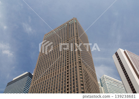 Landscape of the office town looking up at a skyscraper Landscape of the office town looking up at a skyscraper 139238681