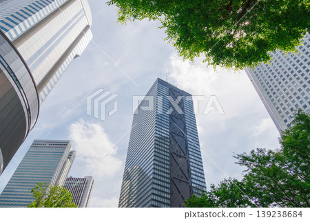 Landscape of the office town looking up at a skyscraper Landscape of the office town looking up at a skyscraper 139238684