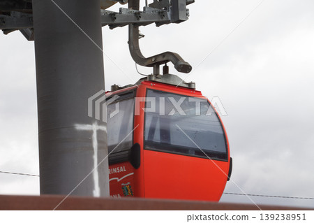 Red Cable Car on Cloudy Day Red Cable Car on Cloudy Day 139238951