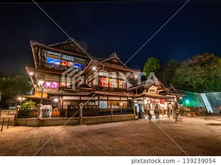 Dogo Onsen Main Building at night and the colorful illuminations Dogo Onsen Main Building at night and the colorful illuminations 139239054