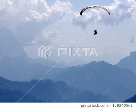 paragliding in dolomites mountains paragliding in dolomites mountains 139240561